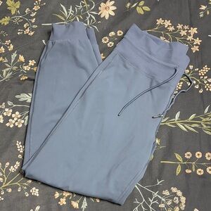 Vuori High-Waisted Drawstring Waist Ribbed Jogger Leggings in Blue Medium